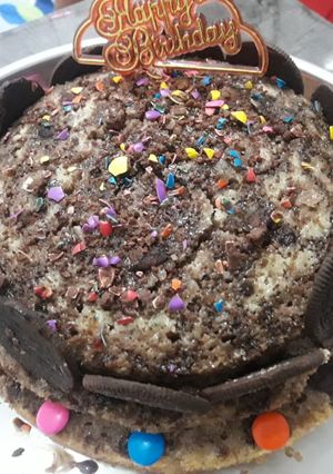 A picture of Chocolate vanila layered cake.
