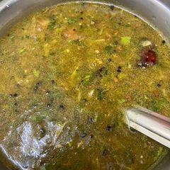 A picture of South Indian rasam.