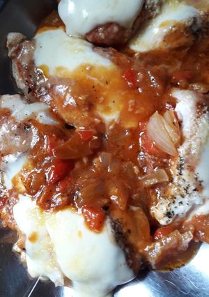 Una foto de Bifes de pollo a la napolitana