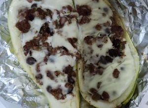 Una foto de Barquitos de zucchini y carne