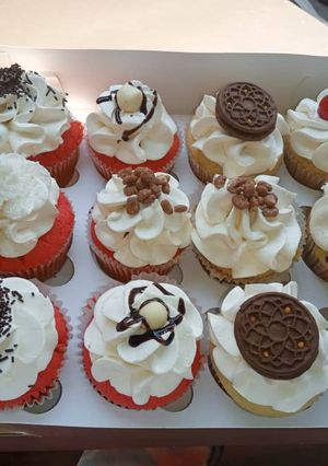 A picture of Cuppies with whipped cream.