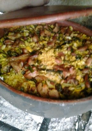 Una foto de Arroz con lapa en cazuela de barro (a leña)