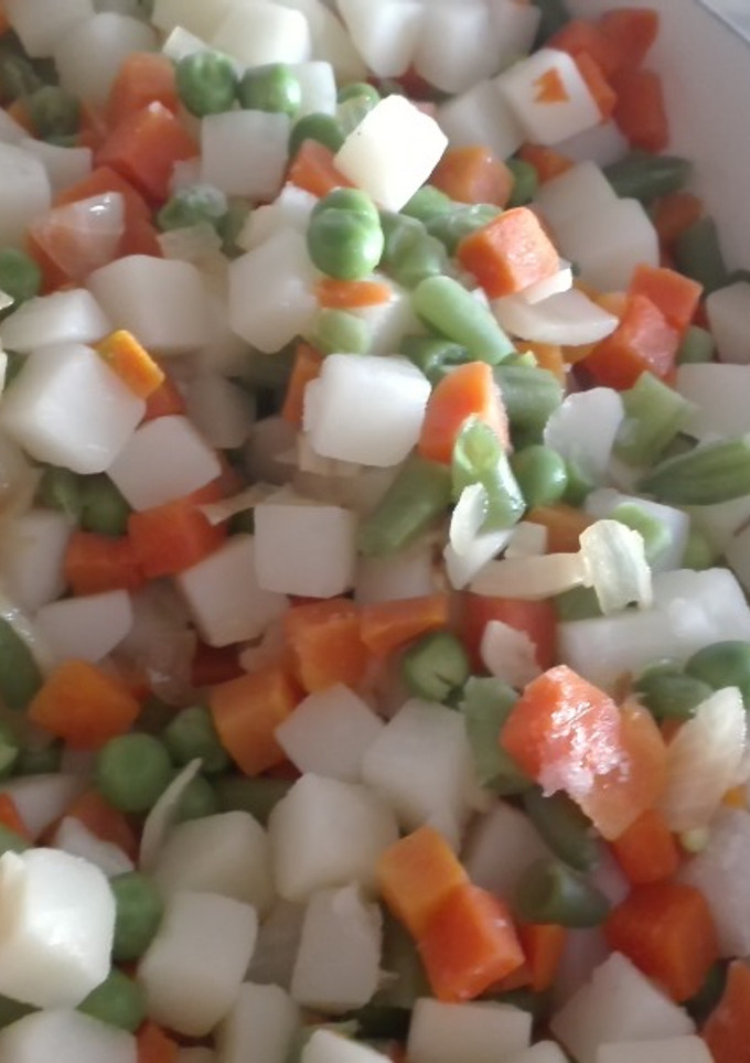 Una foto de Jardinera de verdura con cebolla caramelizada