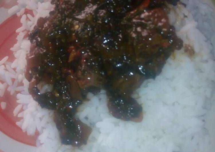 White rice and ugwu stew