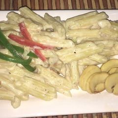 A picture of Alfredo mushroom penne pasta.