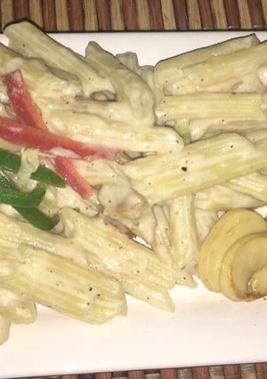 A picture of Alfredo mushroom penne pasta.