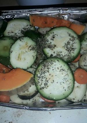 Una foto de Pescado al horno con verduras