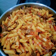 A picture of Macaroni and left over Nyama Choma.