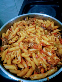 A picture of Macaroni and left over Nyama Choma.