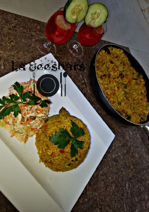 A picture of Chinese fried rice,coleslaw and chapman.