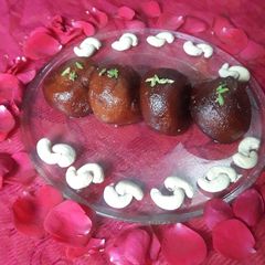 A picture of Dryfruits stuff Gulab jamun.