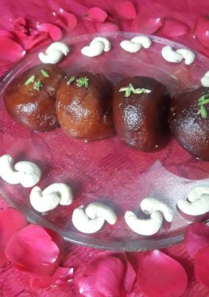 A picture of Dryfruits stuff Gulab jamun.