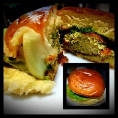 A picture of Chicken Burger with Creamy Spinach Sauce.