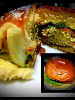 A picture of Chicken Burger with Creamy Spinach Sauce.