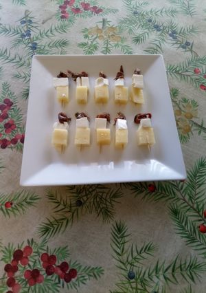 Una foto de Brochetas mar y tierra