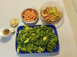 Una foto de Ensalada mango rúcula