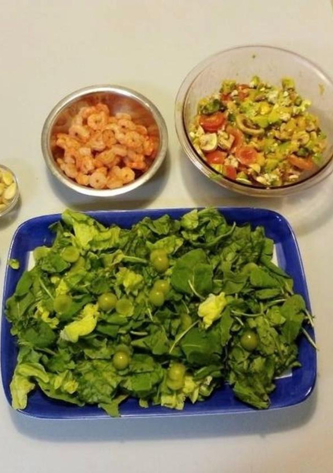 Una foto de Ensalada mango rúcula