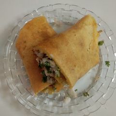 A picture of Paneer stuffed moong dal chilla.