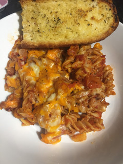 A picture of Tomato, onion and tuna pasta bake.