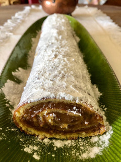 Una foto de Arrollado relleno de dulce de leche