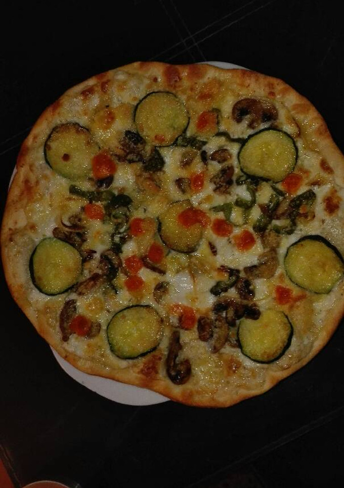 Una foto de Pizza de verduras