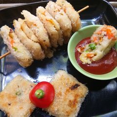 A picture of Sooji Veggie mini squares.