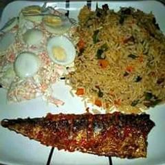 A picture of Noodles with Roasted fish and coleslaw salad.