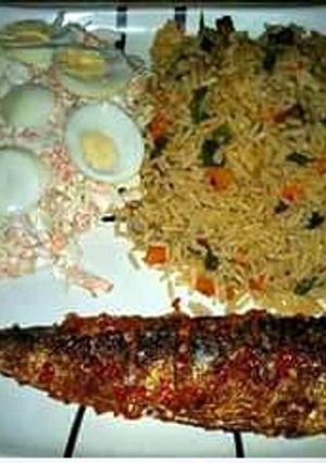 A picture of Noodles with Roasted fish and coleslaw salad.