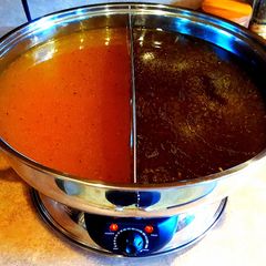 A picture of Mike's Homemade Chicken & Beef Broth.