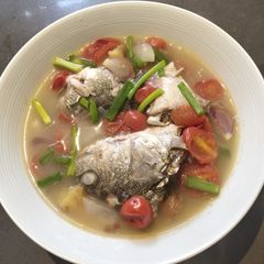 A picture of Fish Head in Tomatoes.