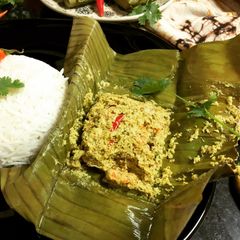 Chingri Macher Paturi (Prawns Steam Cooked in Banana Leaf) A picture of Chingri Macher Paturi (Prawns Steam Cooked in Banana Leaf).