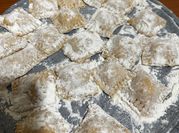 Una foto de ravioli cuatros queso