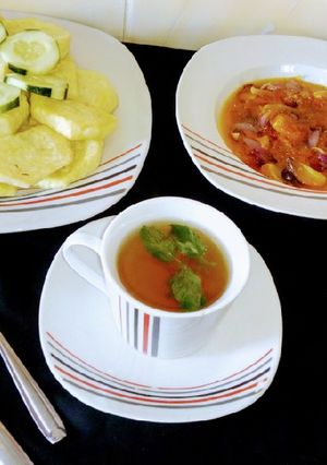 A picture of Fried yam with sauce.