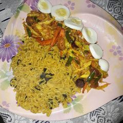 Noddles, stir fried vegetables and boiled egg A picture of Noddles, stir fried vegetables and boiled egg.