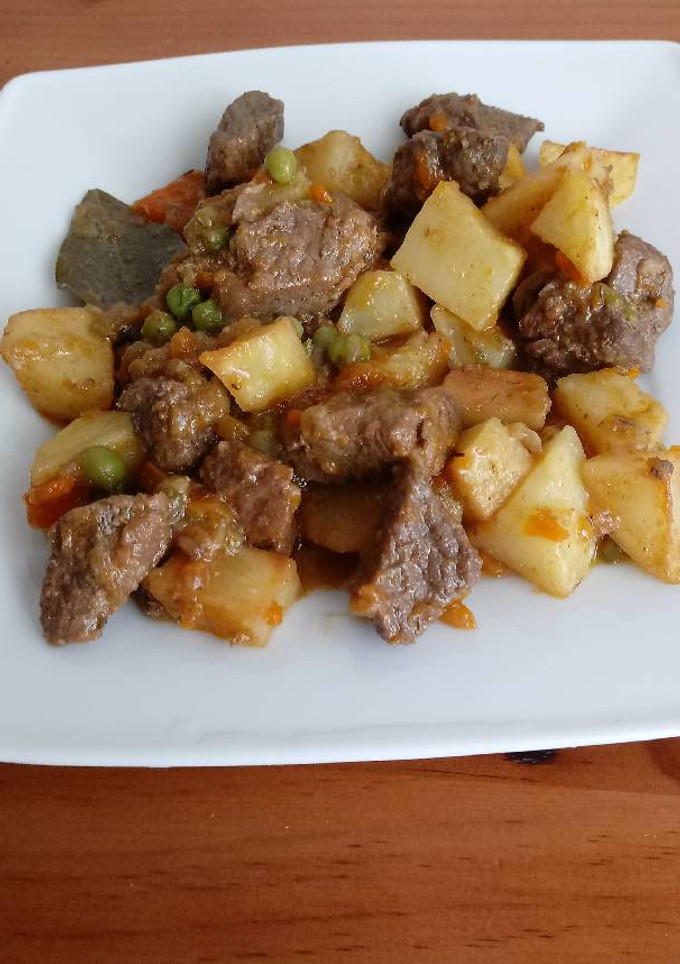 Una foto de Carne compuesta estilo canario