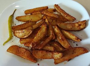 Foto principal de Patatas condimentadas al horno
