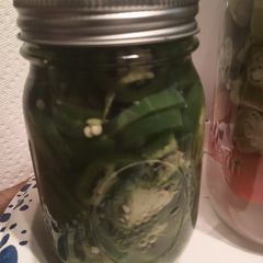 A picture of Sliced up Pickled Jalapeno Peppers.