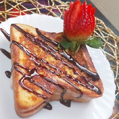 A picture of Strawberry filled French Toast.