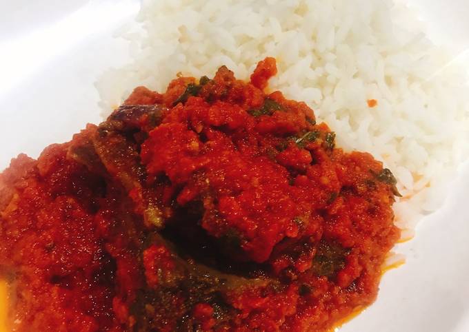 Palm oil stew and boiled rice