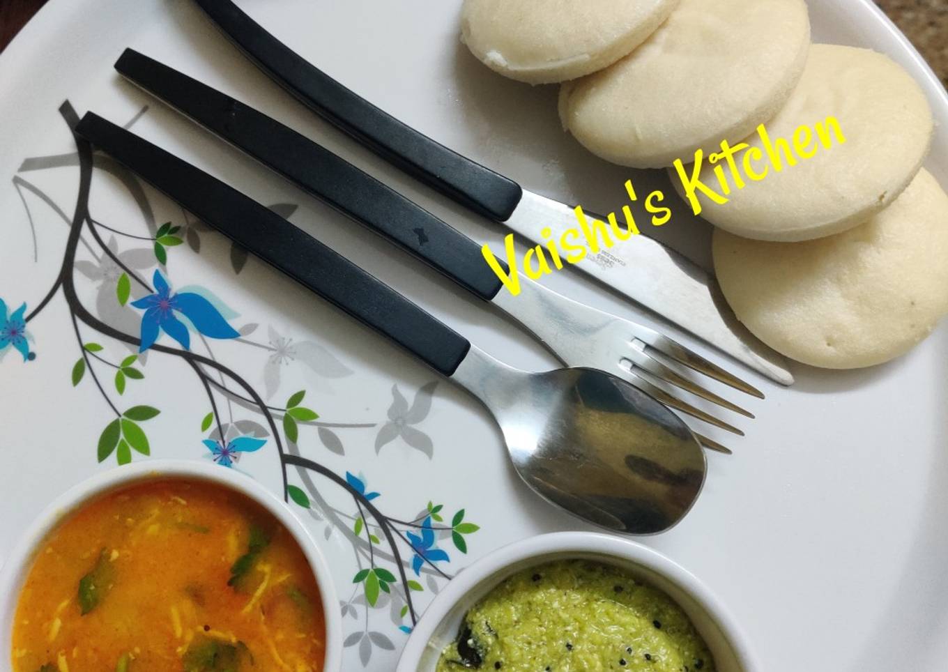 Sambar with idli and coconut chutney