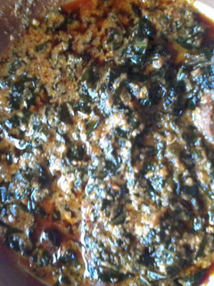 A picture of Egusi soup and beef.