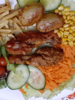A picture of Chicken Steamed Roast with Salad.