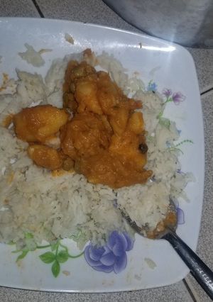 A picture of Rice and thick stew.