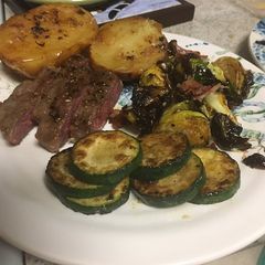 A picture of Greek potatoes in da airfryer.