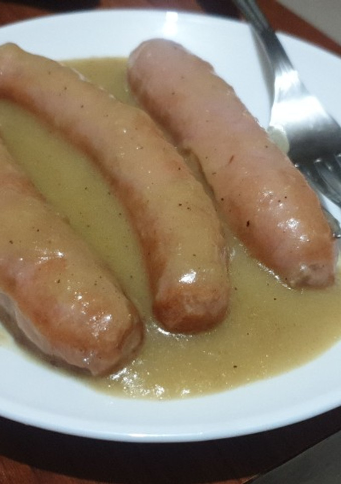 Una foto de Salchichas con cebolla