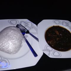 A picture of Tuwon shinkafa and Spinach soup.