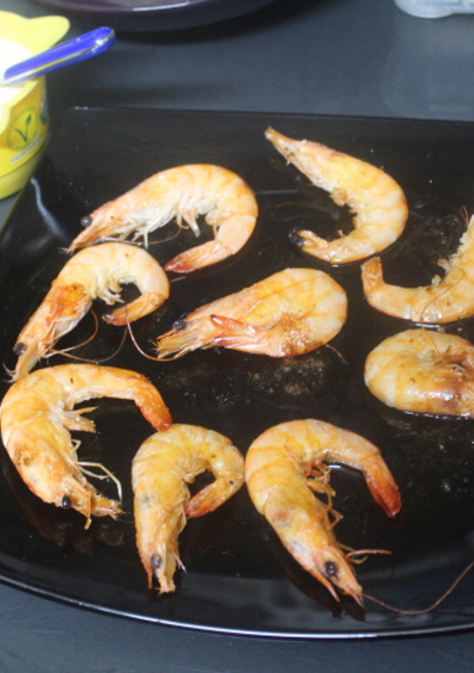 Una foto de Gambas flambeadas con all i oli