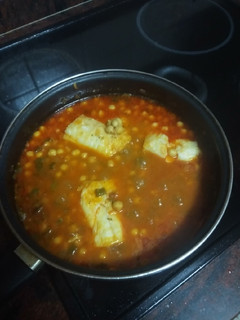 Una foto de Bacalao con garbanzos