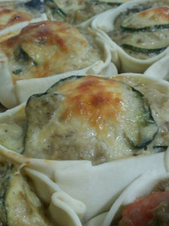 Una foto de Canastitas zucchini, zapallito y berenjenas
