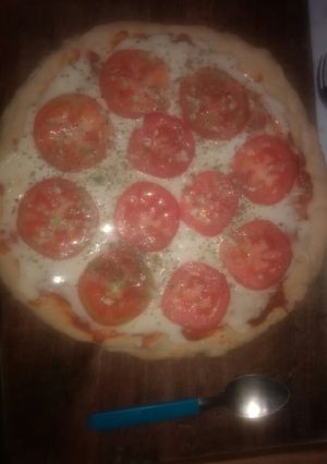 Una foto de Pizza 🍕🍕🍕